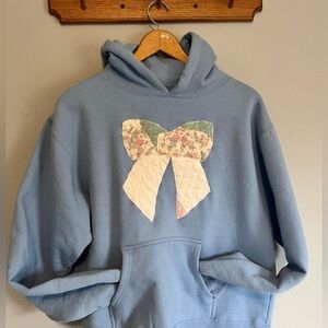 Blue Hoodie with Floral Bow Design repurposed and upcycled from vintage quilt